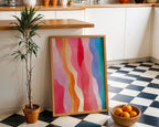 Rainbow waves print displayed on a black-and-white kitchen floor