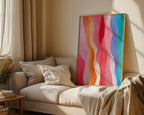 Rainbow waves print styled beside a neutral sofa