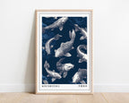 Japanese koi fish print in a pale wood frame against a white wall